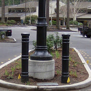 Bollards and Sleeve's Metro Decorative Bollard Covers in Parking Lot Island