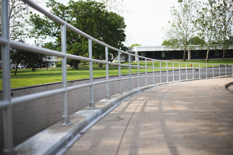 Long run of three line Aluminum Handrail around the headquarters of Ford Motor Company 