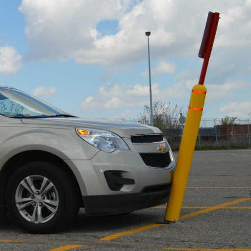 FlexPost Bollard Sign System being impacted by a vehicle to show it's ability to flex and give into the impact