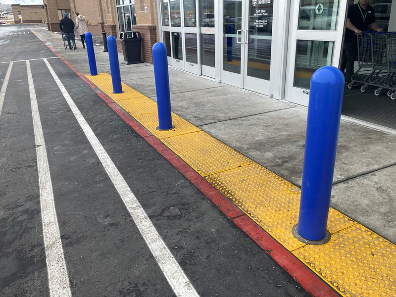 1/4" Blue Bollard Covers at storefront 