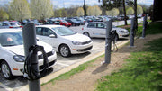 Electric Vehicle Charging Station's lining a parking lot 