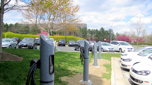 Line of EV Charging Stations in a parking lot 