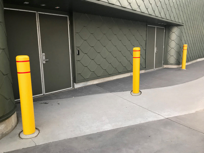 Flat Top Bollard Covers in yellow with red reflective tape 