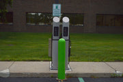 Double Electric Vehicle Charging Stations with protective bollard in front 