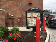 1/8" Red Bollard Covers at a drive-thru 