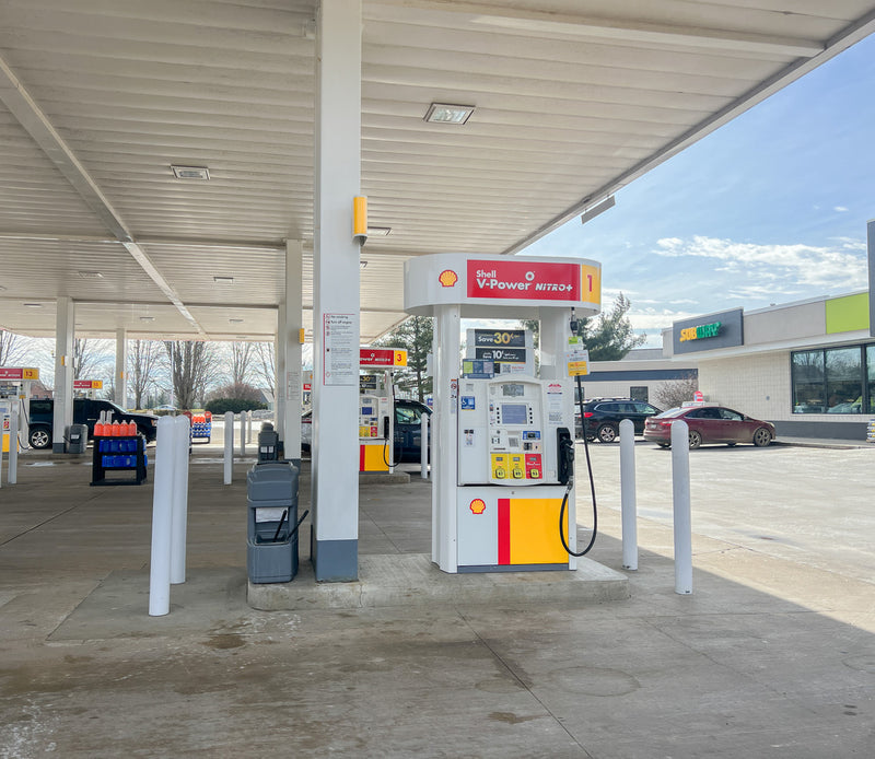 1/4" White Bollard Covers at gas station