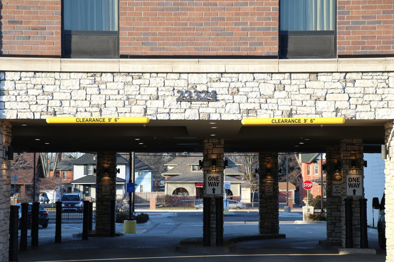4" Hanging Clearance Bars at a hotel entrance 