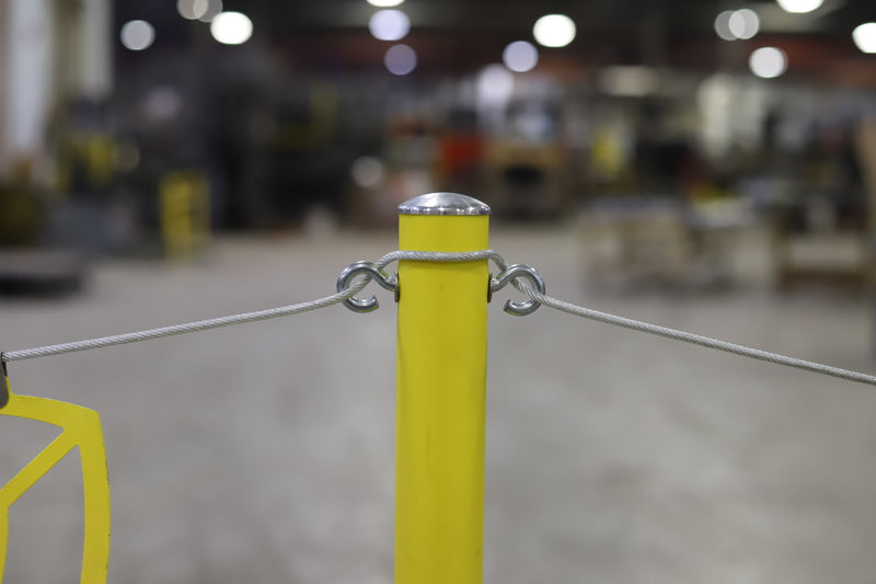 Close up of the Warning Line System stanchion post's eye hooks with the wire 