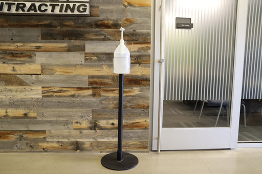 Sanitizer Stand with jug holder outside of offices 