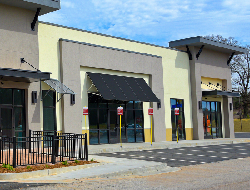 Standard Signpost in Yellow at storefront 
