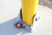 Collapsible Locking Bollard with padlock to keep bollard in position when in use