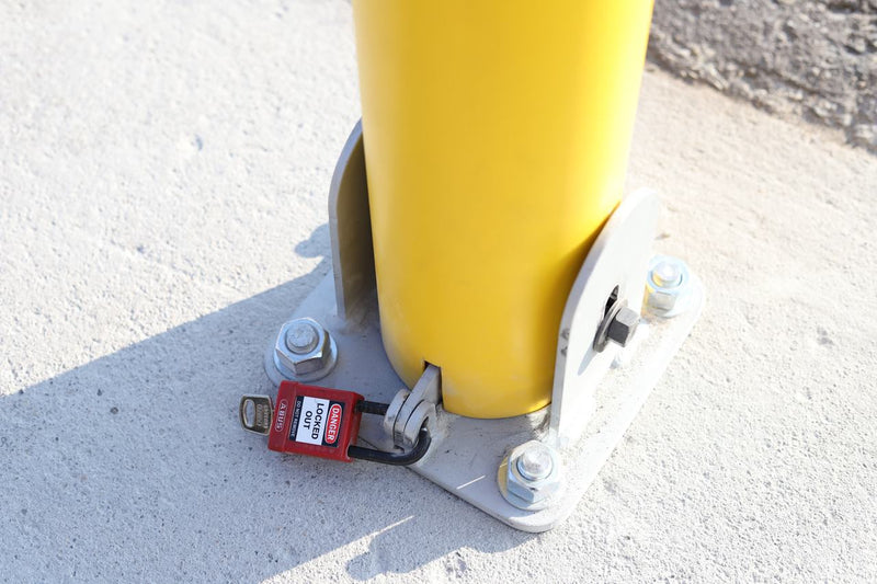 Collapsible Locking Bollard with padlock to keep bollard in position when in use